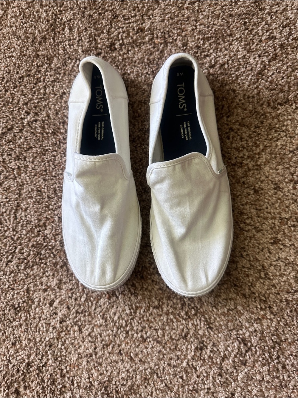 Toms women’s White Canvas Slip-On Loafers